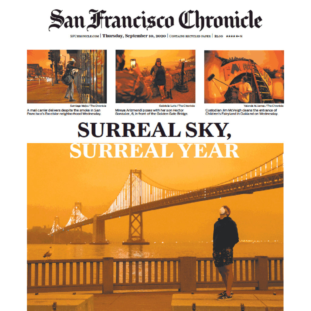 San Francisco Chronicle front page with big headline: Surreal Sky, Surreal Year showing photos of smoky skies over the city.